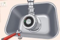 how to reset a garbage disposal